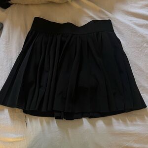 Black TNA tennis skirt with shorts